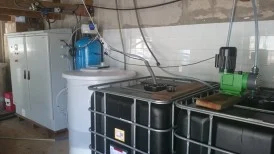 Envirolyte generator connected near an intermediate bulk container and pump