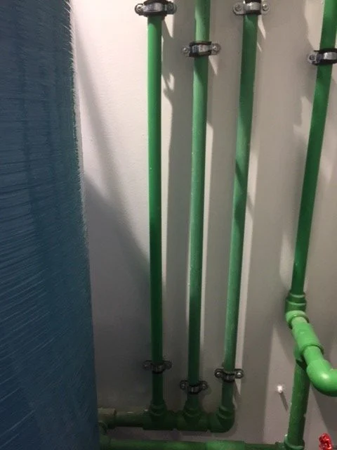 Treated water distribution pipes supplying dental units at an Abu Dhabi clinic
