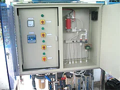 Open hydraulic and control cabinet of a historic rural disinfection system