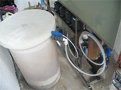 Brine tank connected to a historic Envirolyte rural water treatment unit