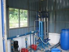 Water-treatment piping and equipment inside the Kampong Jejok installation