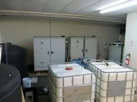 Envirolyte generator cabinets with intermediate bulk containers
