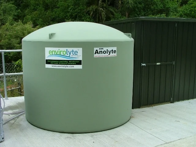 Outdoor anolyte storage tank at an EL-6000 wastewater treatment installation in New Zealand