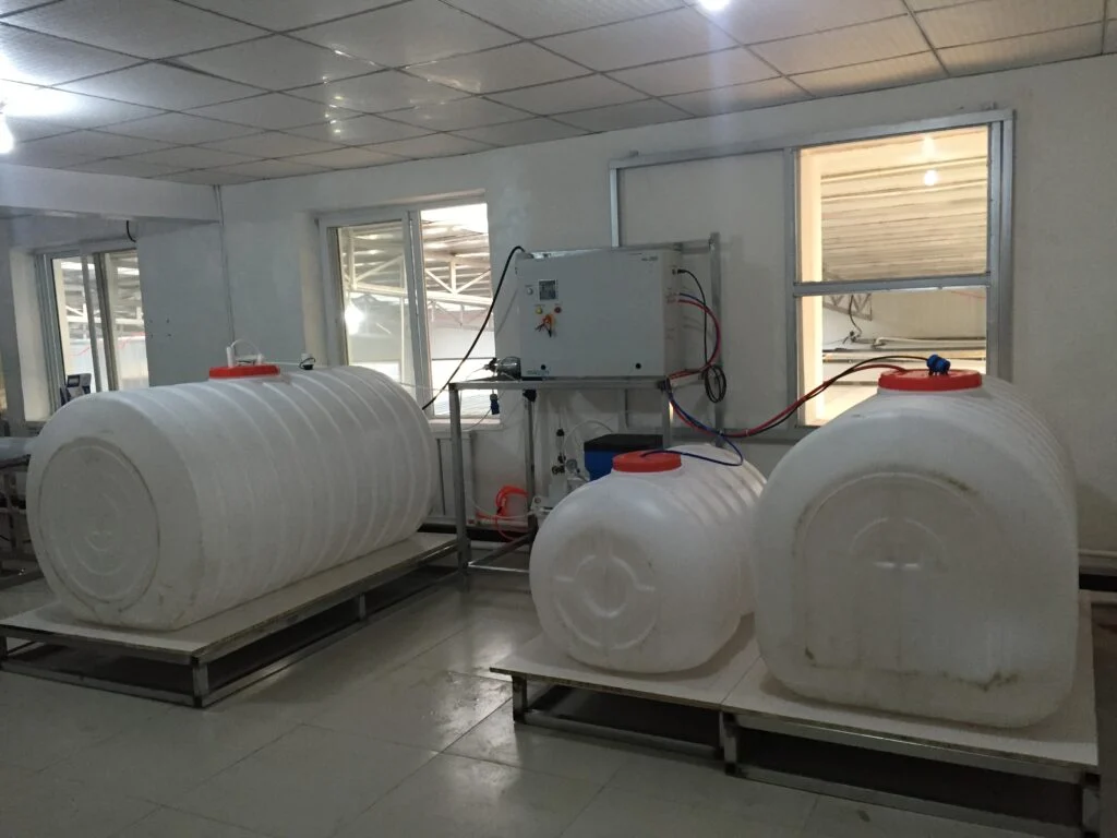 ELA-2000 generator installed between storage tanks for reverse-osmosis water and generated solutions in Liaoning Province, China
